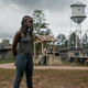 Michonne (Danai Gurira) walks around Hilltop while humming “I’m Just a Bill” to herself.